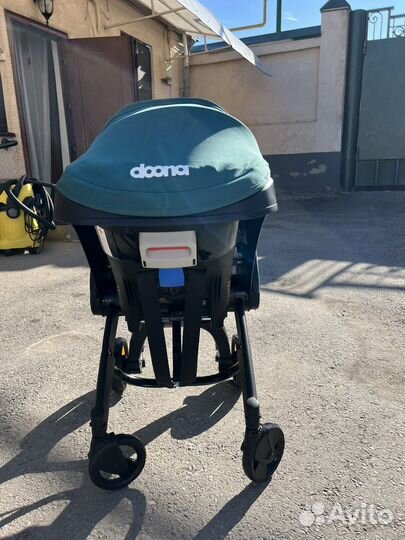 Коляска автокресло doona с базой isofix