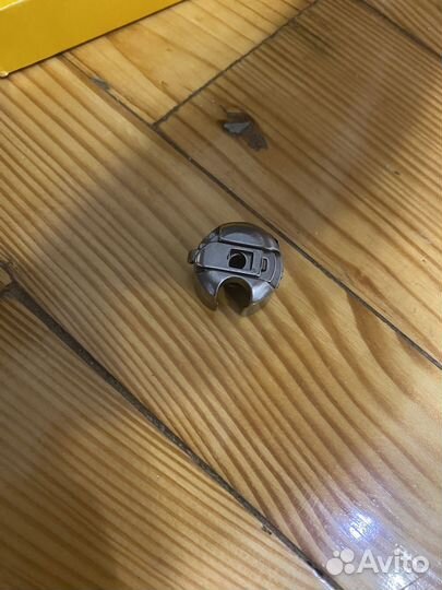 Шпульный колпачок