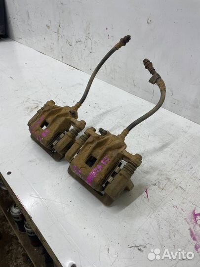 Задний тормозной суппорт Hyundai Sonata EF