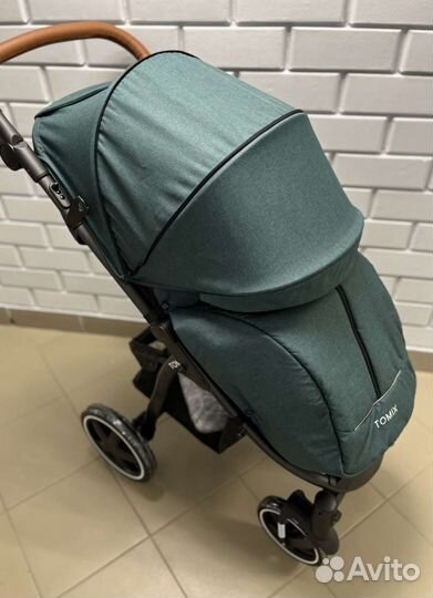 Прогулочная коляска Tomix dark green новые