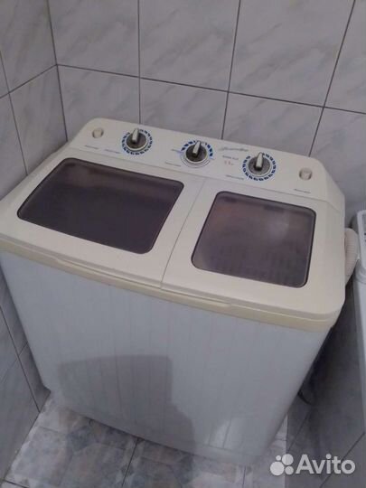 Стиральная машинка с вертикальной загрузкой