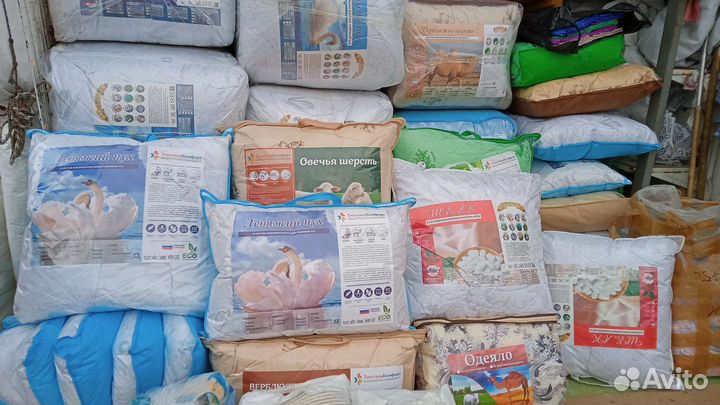 Подушки и одеяла из лебяжьего пуха