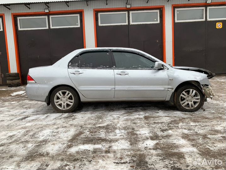 Стеклоподъемник задний левый Митсубиси Лансер 9