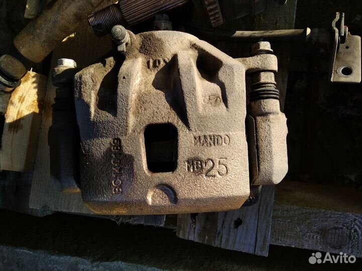 Суппорт тормозной передний левый Elantra 10-13г