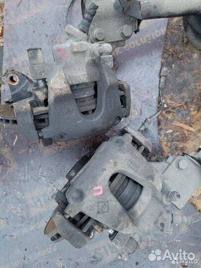 Суппорт тормозной передний Renault Logan 2 рест