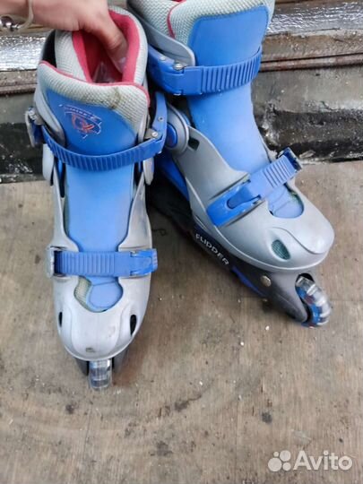 Роликовые коньки