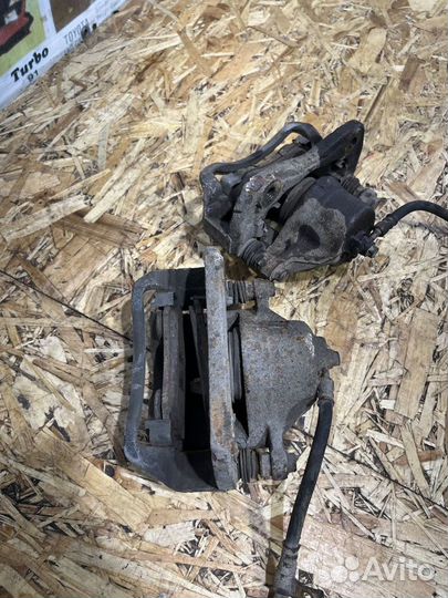 Суппорт тормозной Киа Маджентис 2 рест