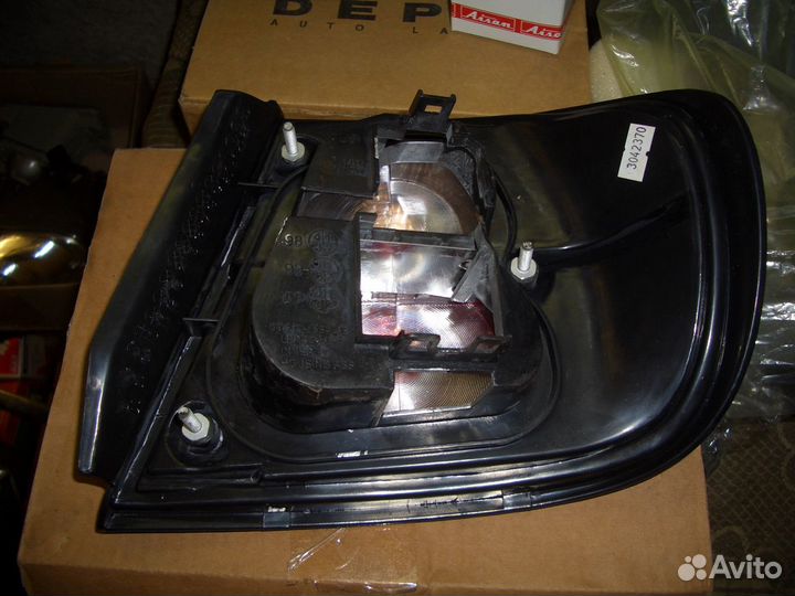 Фонарь левый Ниссан Примера Р11 с96-02г новый Depo