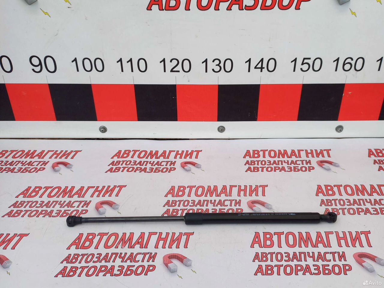 Амортизатор крышки багажника Рено Аркана