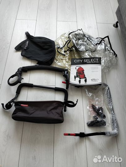 Коляска для погодок baby jogger city select