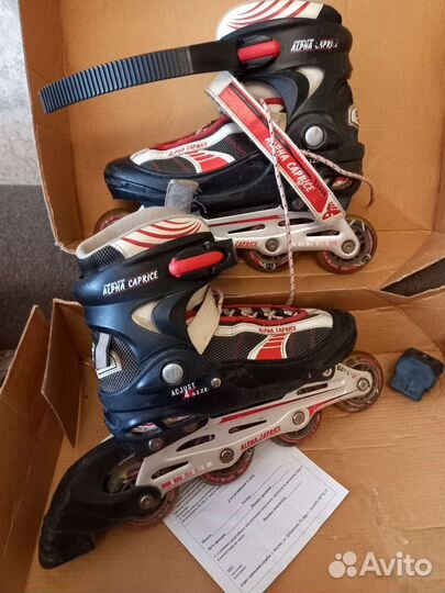 Роликовые коньки