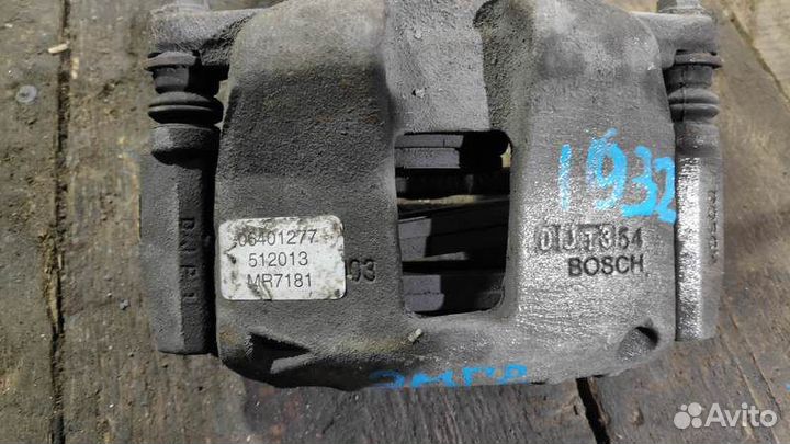 Суппорт тормозной передний левый Geely Emgrand EC7