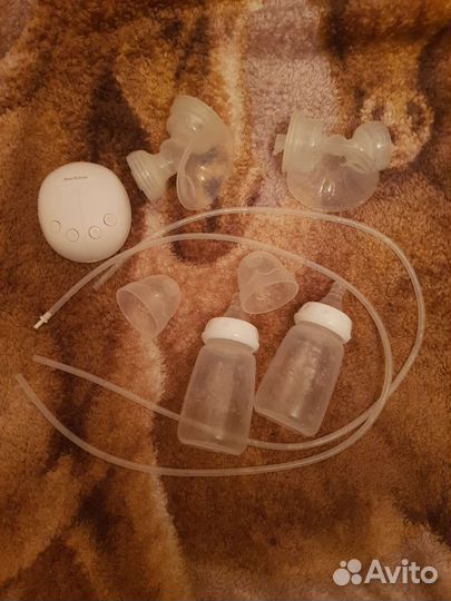 Молокоотсос электрический на 2 груди