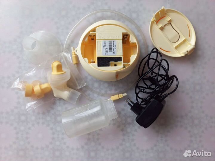 Молокоотсос Medela Swing+ручной Kari+бутылочки