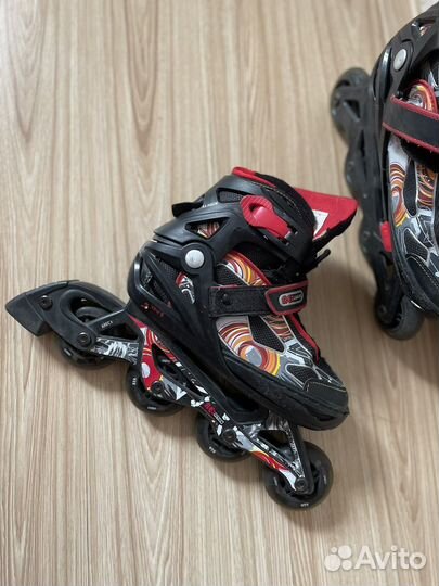 Роликовые коньки