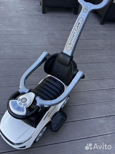 Машинка каталка с ручкой