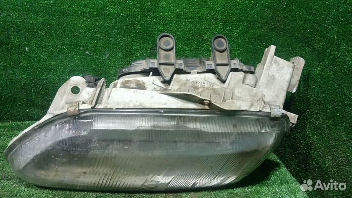 Фара левая Renault Laguna