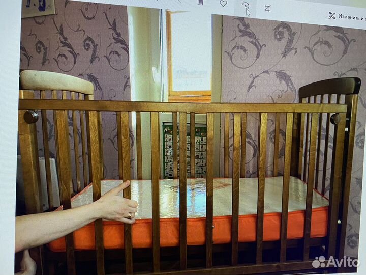 Детская кроватка с поперечным маятником