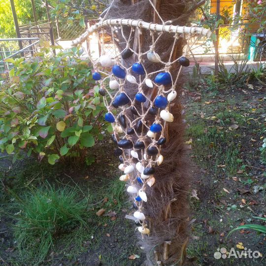 Пано из ракушек на палочке бамбука