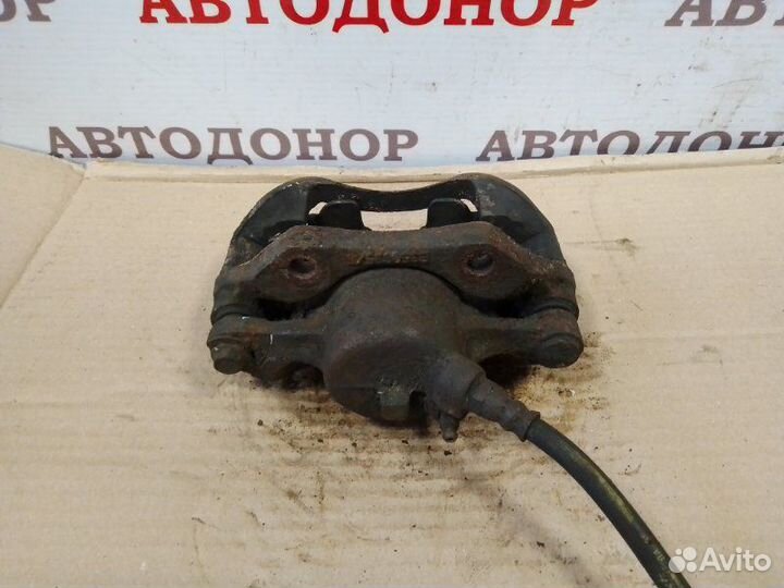 Суппорт тормозной передний левый Renault Kangoo