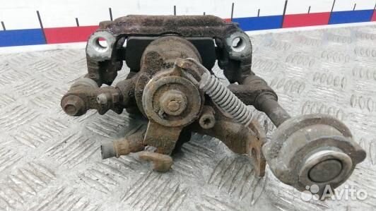 Суппорт тормозной задний левый opel astra J (LEA12