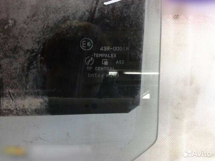 Стекло двери задней левой Suzuki Liana 2001-2007