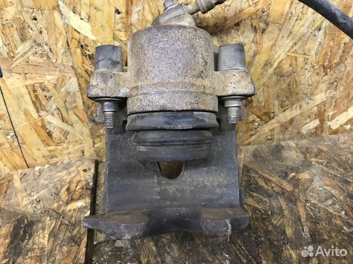 Суппорт тормозной передний правый Skoda Fabia 2