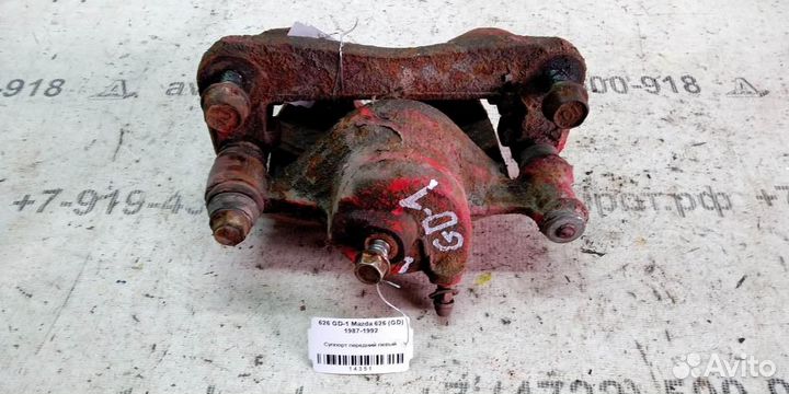 Суппорт передний левый Mazda 626 GD 87-92г