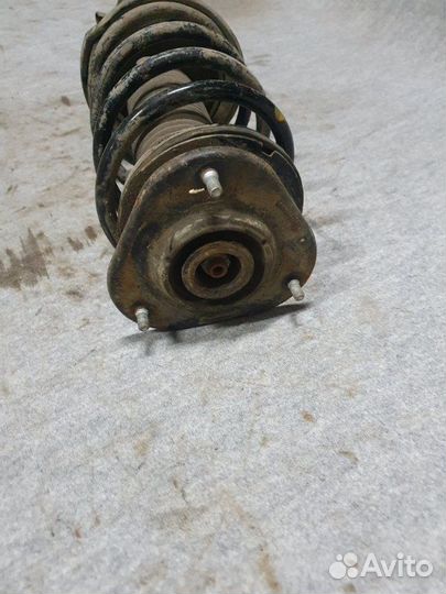 Стойка подвески передняя правая Geely Emgrand Ec7