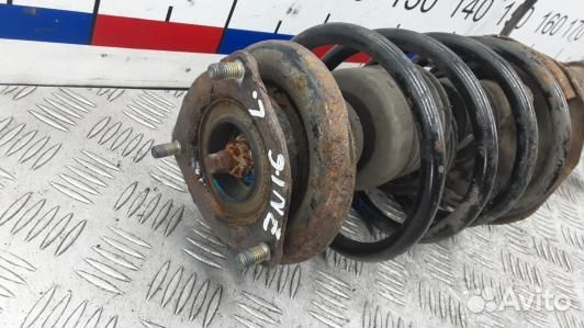 Стойка передняя левая nissan almera N16 (ZNI06K501