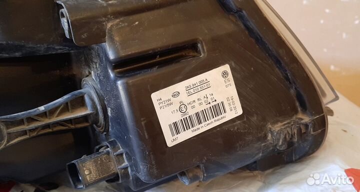 Фара левая Volkswagen Cadd