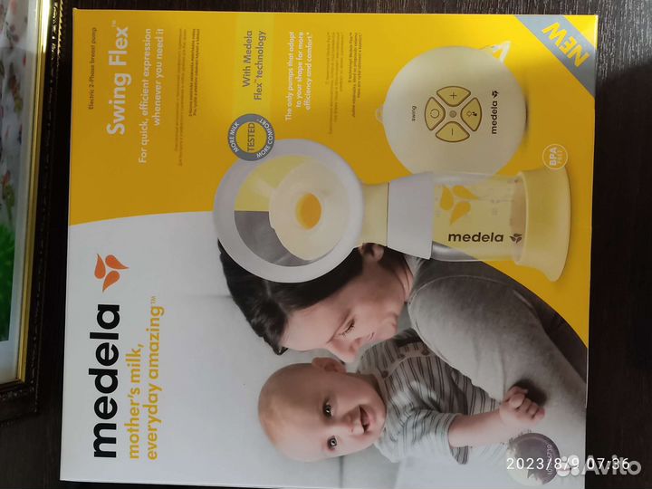 Молокоотсос medela swing flex