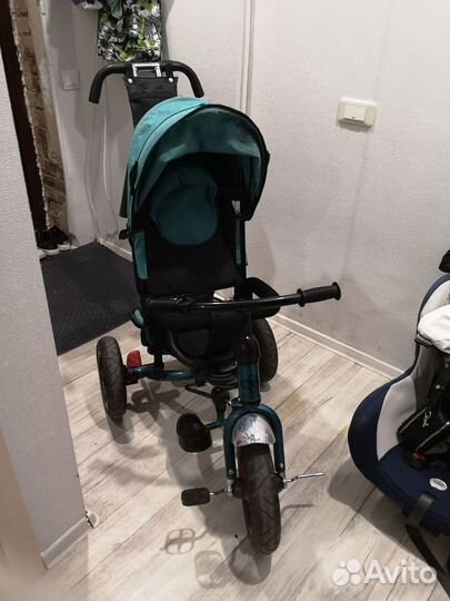 Трехколесный велосипед с ручкой