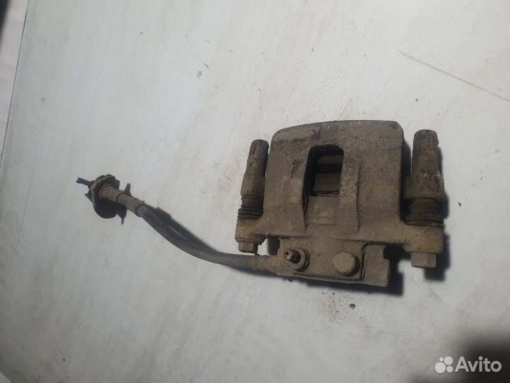 Суппорт тормозной передний правый Mitsubishi