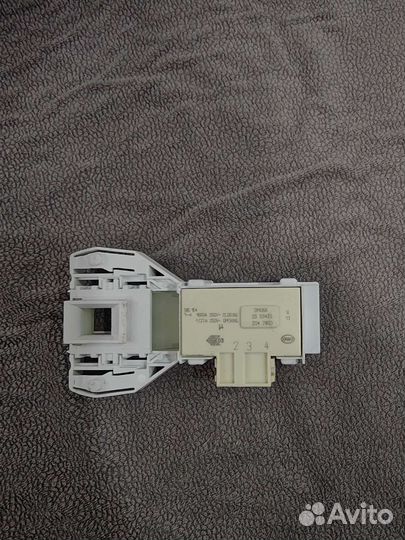 Устройство блокировки люка