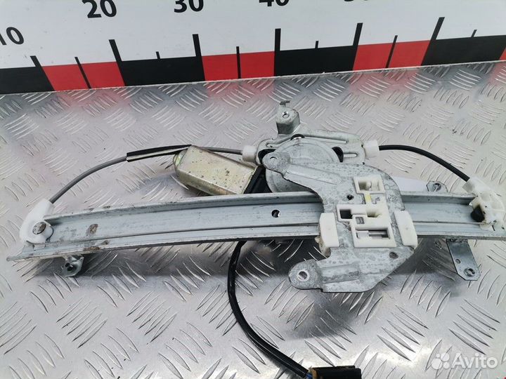 Стеклоподъемник электрический задний правый Nissan