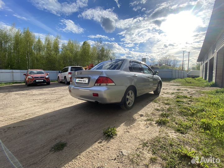 Mitsubishi Lancer 1.6 МТ, 2003, 300 000 км
