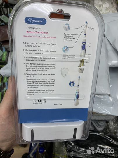 Электрическая зубная щетка