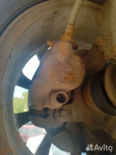 Суппорт правый левый Kia Sephia