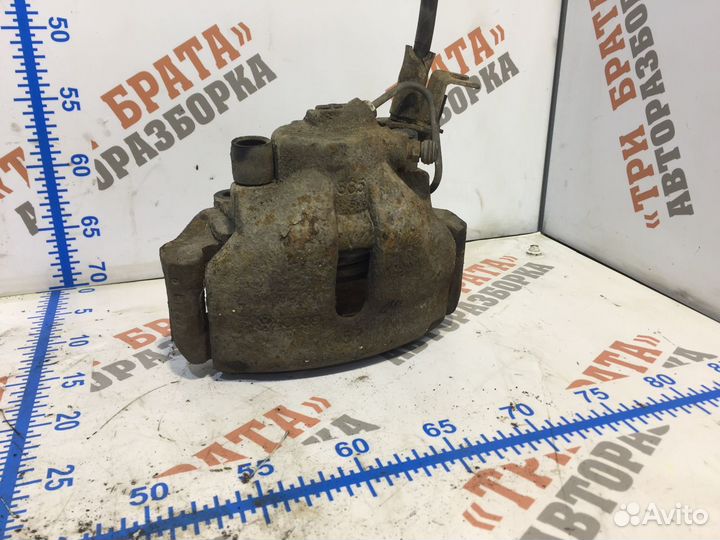 Фольксваген Пассат Суппорт передний Прав