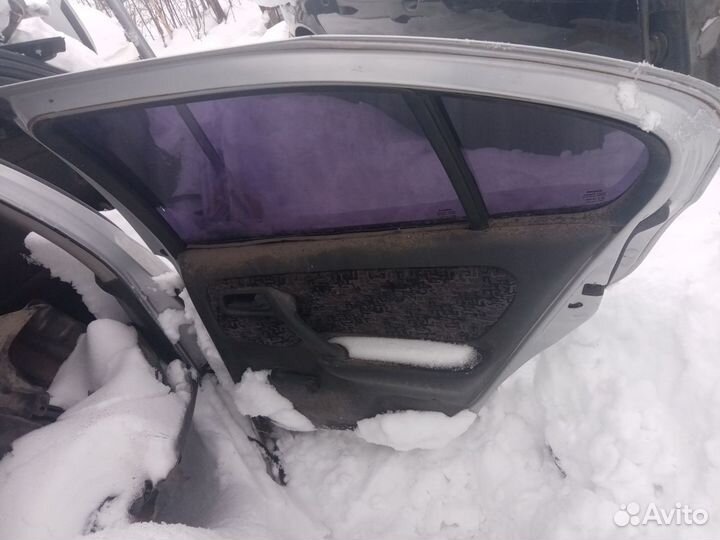 Дверь задняя правая Nissan Primera седан (Р11)