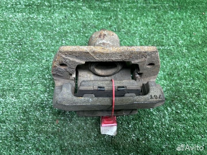 Тормозной суппорт задний правый Mazda Сх7