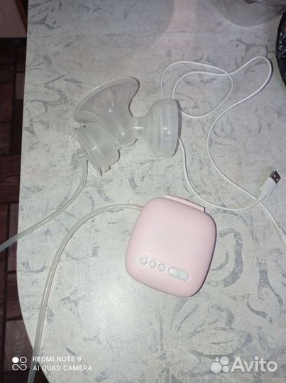 Электрический молокоотсос