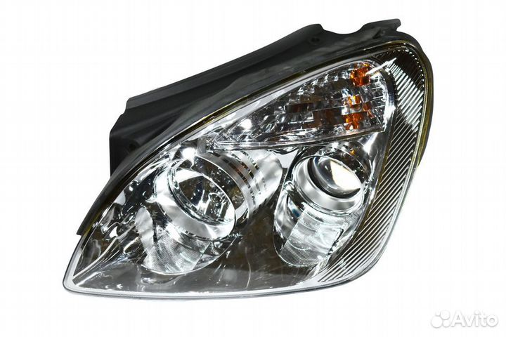 Фара левая Kia Carens