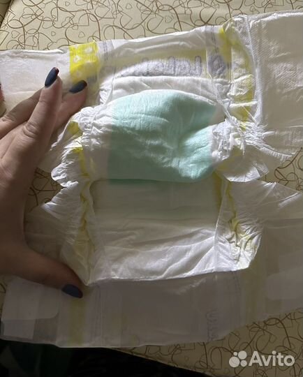 Продам pampers premium care 2 и lalaku 2