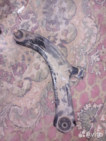 Рычаг левый нисанн тиида