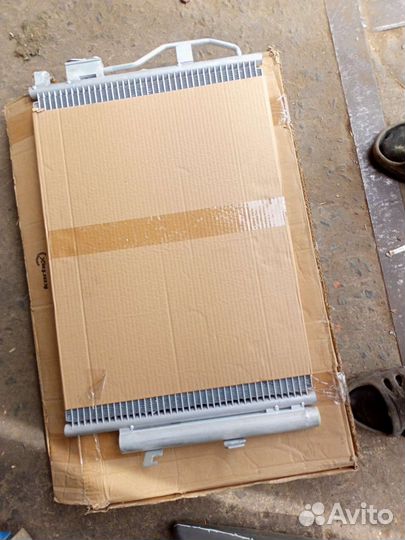 Новый радиатор кондиционера Chevrolet Aveo T300