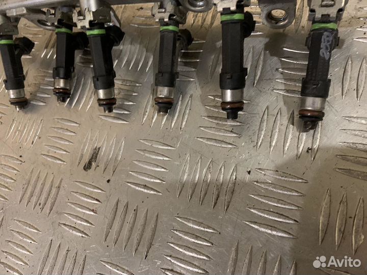 Форсунка инжекторная электрическая Mitsubishi Outl