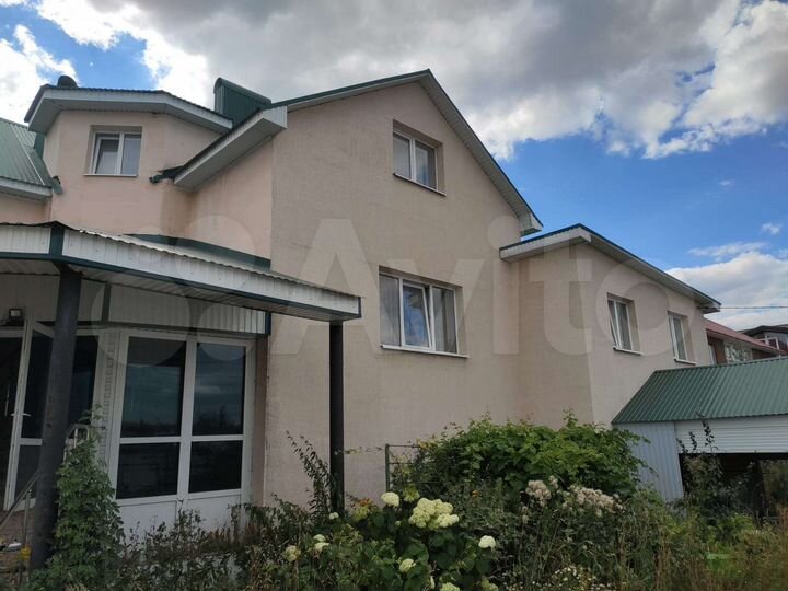 Коттедж 410 м² на участке 13 сот.