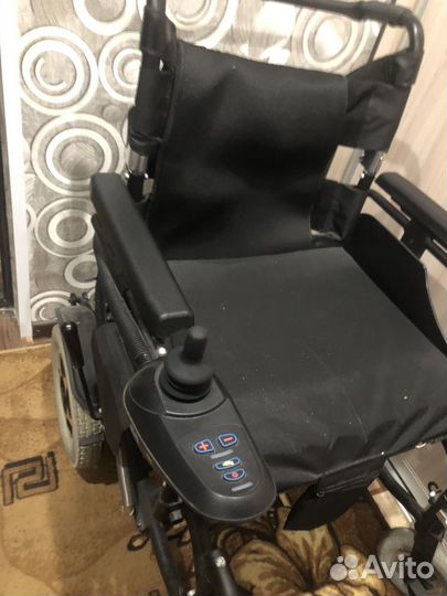 Инвалидная коляска с электроприводом